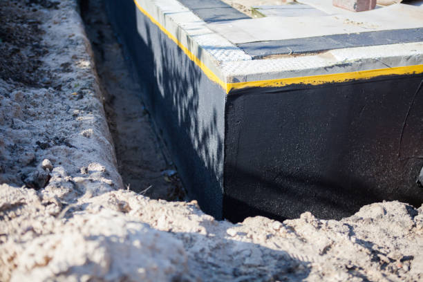 Professional Wet Basement Repair technician working in Hudson, MI